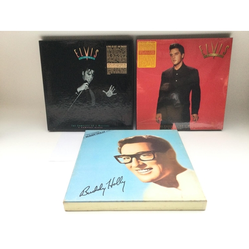 74 - Three box sets comprising 'The Complete Buddy Holly' 6LP box set and two Elvis Presley CD box sets, ... 