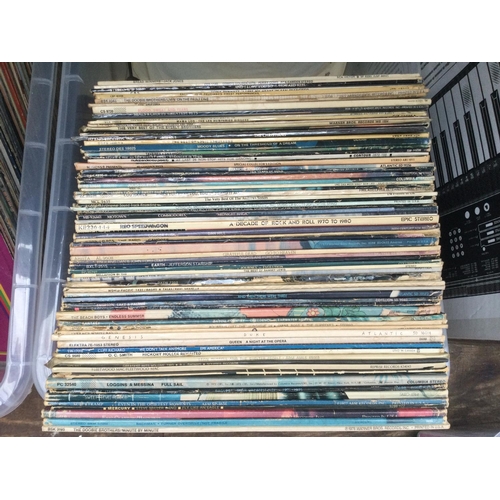 76 - A box of LPs by various artists including Queen, REO Speedwagon, Blood, Sweat & Tears and ohers..