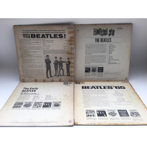 80 - Four early US pressings of Beatles LPs. Some condition issues, feelable scratches, damaged covers.