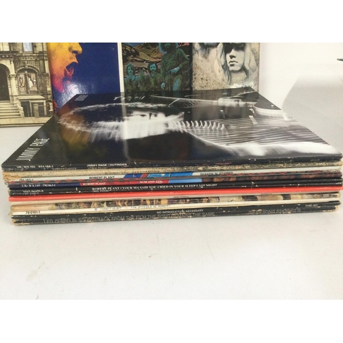 807 - A record case of rock LPs and 12