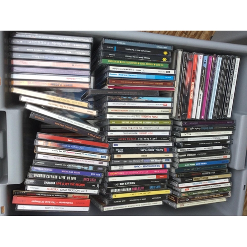 86 - Four boxes of CDs and DVDs by various artists including King Crimson, Led Zeppelin, John Mayall, Dee... 