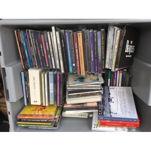 86 - Four boxes of CDs and DVDs by various artists including King Crimson, Led Zeppelin, John Mayall, Dee... 