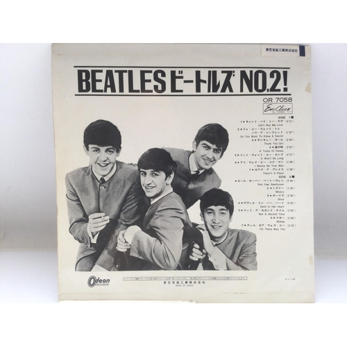 9 - A rare and early Japanese pressing of The Beatles 'Second Album' on red vinyl complete with obi stri... 