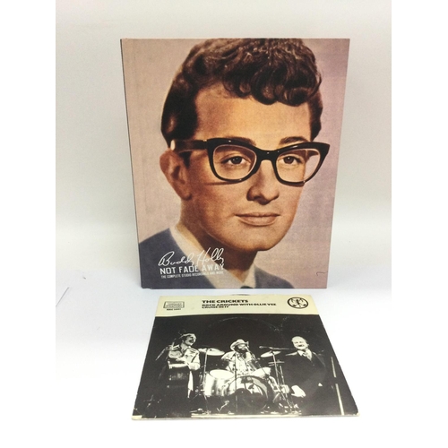 98 - A limited edition Buddy Holly 'Not Fade Away' CD box set and 7inch single by The Crickets.
