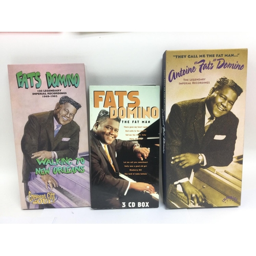 99 - Three Fats Domino CD long boxes.