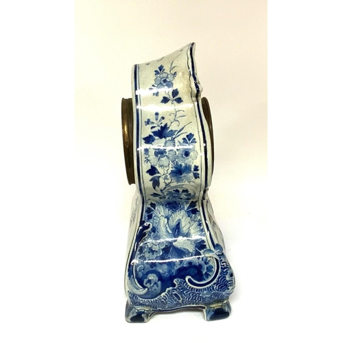 1001 - Delft Blue And White Ceramic Mantle Clock. 37cm. (Catagory D.Postage no avaliable).