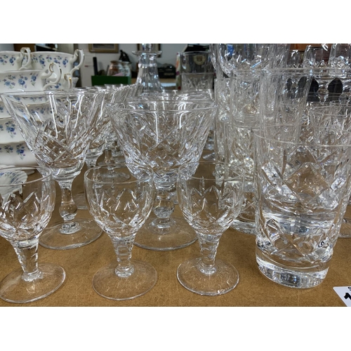 1014 - A collection of Stuart Crystal glassware, approximately 46 pieces including decanter. (D, postage no... 