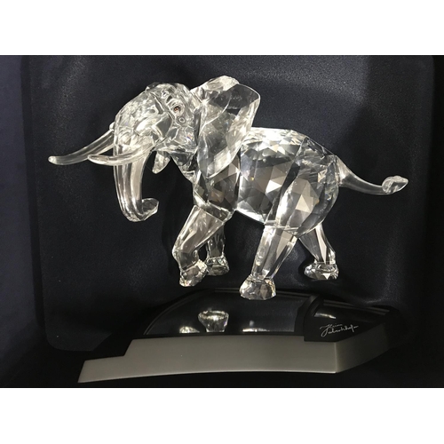 1047 - A cased Swarovski limited edition Elephant with stand. 01962/10000, together with Certificate of Aut... 