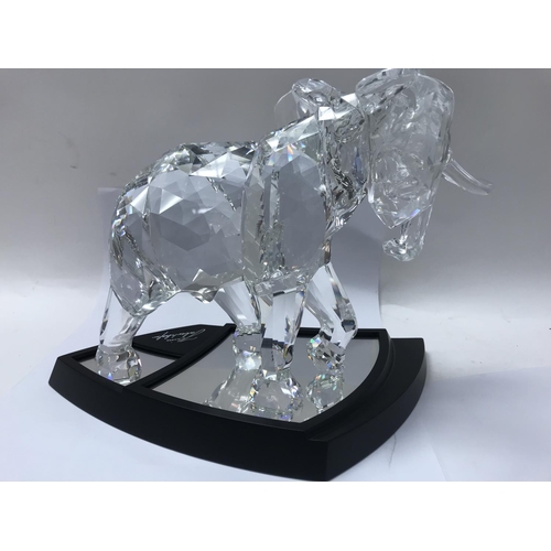 1047 - A cased Swarovski limited edition Elephant with stand. 01962/10000, together with Certificate of Aut... 