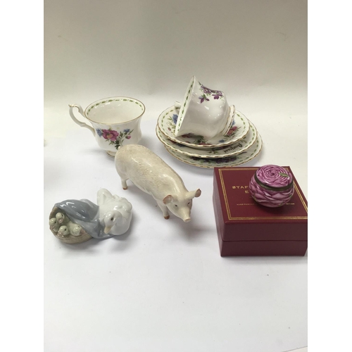 1049 - A mixed lot of ceramics including part of a royal Albert tea set, a Beswick pig figure A Lladro figu... 