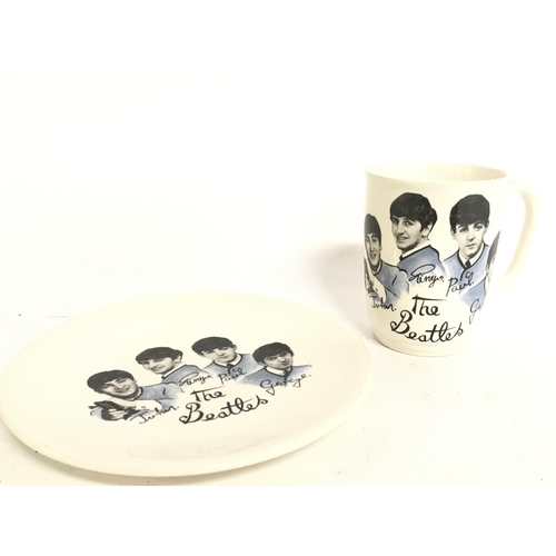 1051 - A 1960s Beatles plate and mug by Broadhurt Bros Burselm & Washington Pottery. This lot cannot be pos... 