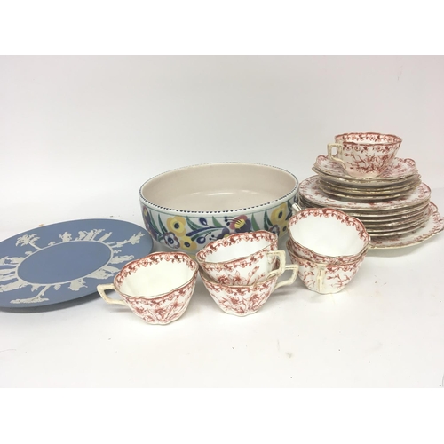 1059 - A Poole pottery bowl a Wedgwood Jasperware plate and a late Victorian tea set with a red floral patt... 