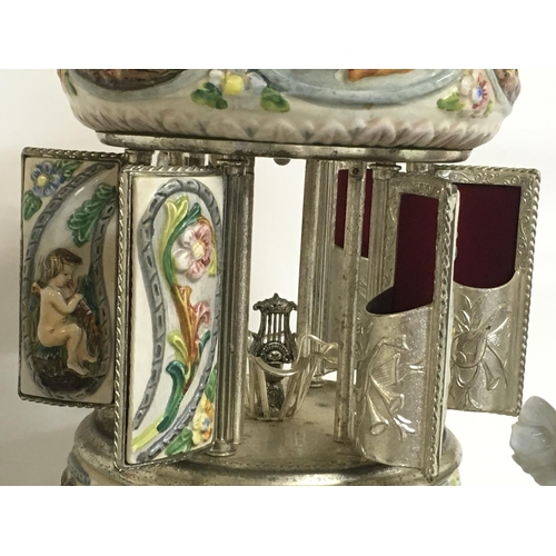 1087 - An Italian ceramic musical cigar holder, Old Country Ways Worcester figure, A Coalport figure and an... 