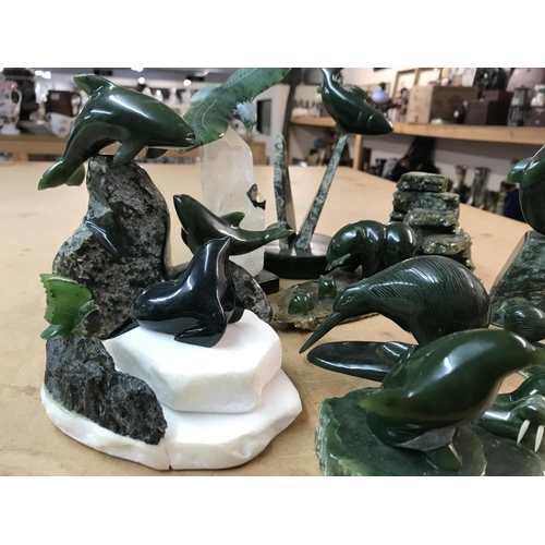 1103 - A collection of carved Jade sculptures- Limited edition including Playful Whales 2/150