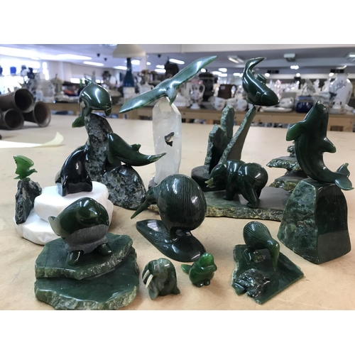 1103 - A collection of carved Jade sculptures- Limited edition including Playful Whales 2/150