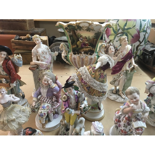 1130 - A collection of 19th century classical style figures including sitzendorf and Dresden