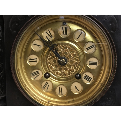 1233 - A slate and brass mantel clock, dimensions 14x34x31cm. This lot cannot be posted