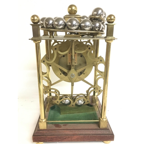 1240 - A Harding and Bazeley Spherical Weight clock no 543. Seen working.