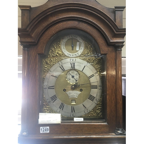 1249 - An oak longcase clock the brass dial with silvered chapter ring maker Sam Cannon London eight day go... 