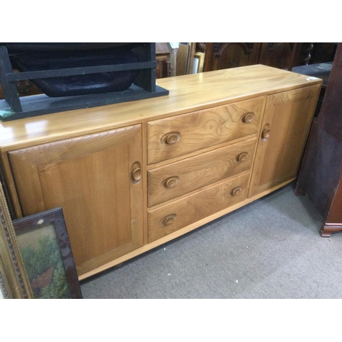 1257 - An Ercol sideboard, approx 155cm x 68cm x 45cm. Shipping category D