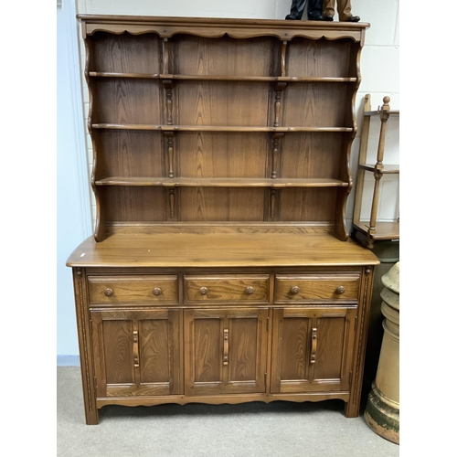 1261 - An Ercol Welsh Dresser 3 Drawers 2 Cupboards Shelving Golden Dawn. 146cm x 191cm x 50cm