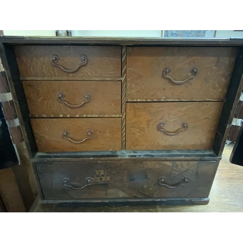 1298 - A Japanese parquetry collectors cabinet with lacquered panels and metalwork mounts. 48cm x 44cm x 28... 