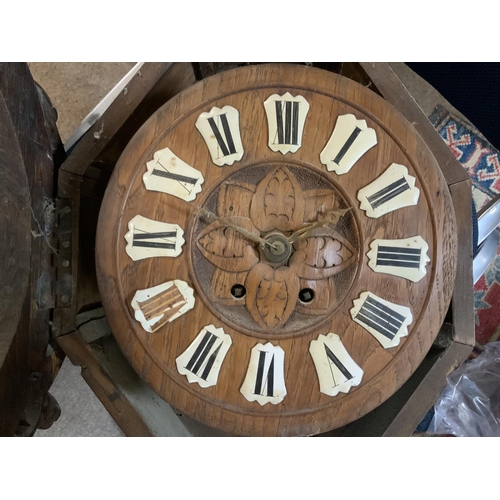 1306 - A 19thC Black Forest oak carved oak wall clock. (D)