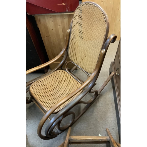 1318 - A 19thC bentwood cane rocking chair. (D)