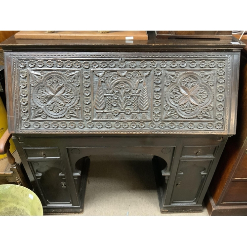 1320 - A large carved oak drop front bureau, 123cm x 120cm