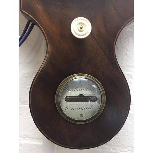 1331 - A Georgian mahogany barometer inset with thermometer box and an enamel dial clock