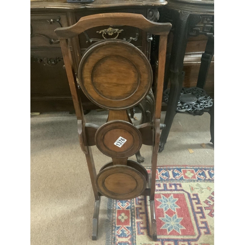 1376 - A 1920s Victorian mahogany folding plate stand.