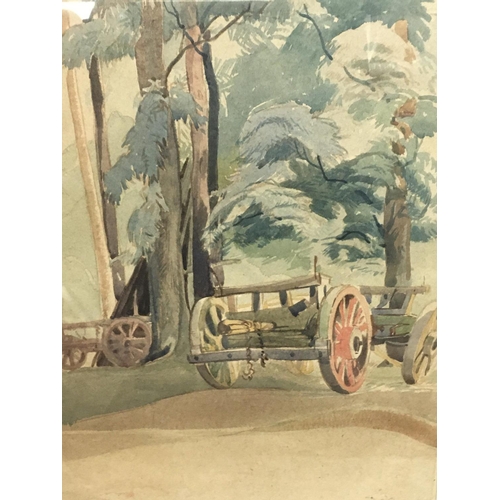 1434 - A framed mid 20th century watercolour by Eric Slater (1896-1963) depicting carts in a forest scene. ... 