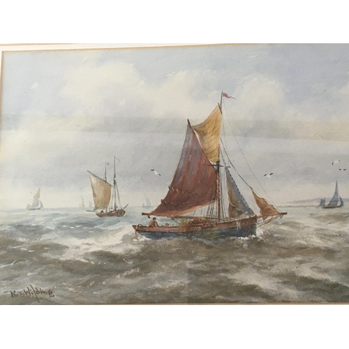 1452 - A framed watercolour Marine view with sailing fishing boats signed by RT Wilding.