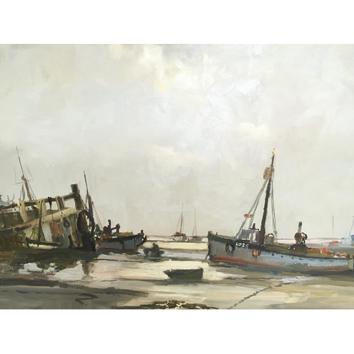 1464 - A large framed oil painting depicting boats at shore by local artist Vic Ellis (1921-1984). Dimensio... 