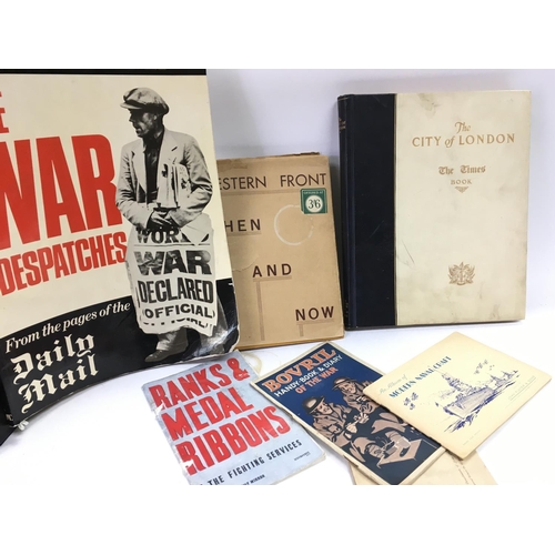 1561 - An assortment of WW1 & WW2 books and other documents including bomb resistance armband and german le... 