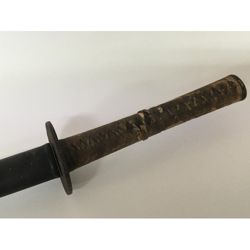 1566 - An Antique Japanese Samurai sword with a bound shagreen grip cast metal tusuba steel folded blade. L... 