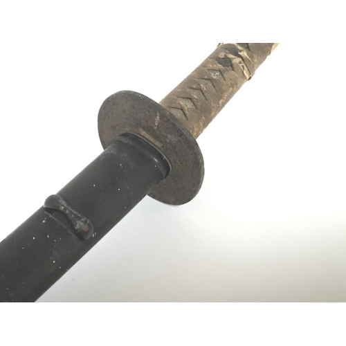 1566 - An Antique Japanese Samurai sword with a bound shagreen grip cast metal tusuba steel folded blade. L... 