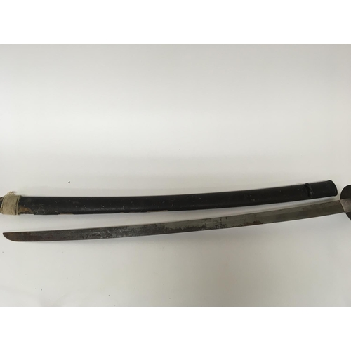 1566 - An Antique Japanese Samurai sword with a bound shagreen grip cast metal tusuba steel folded blade. L... 