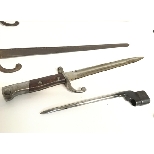 1576 - Bayonets including a German example, a British spike bayonet and French examples. Ranging from 26.5 ... 