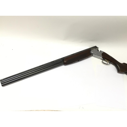 1597 - Baretta 686s 12g over under shotgun. 28inch barrel multi choke and ejector. Serial number E52352B Pl... 