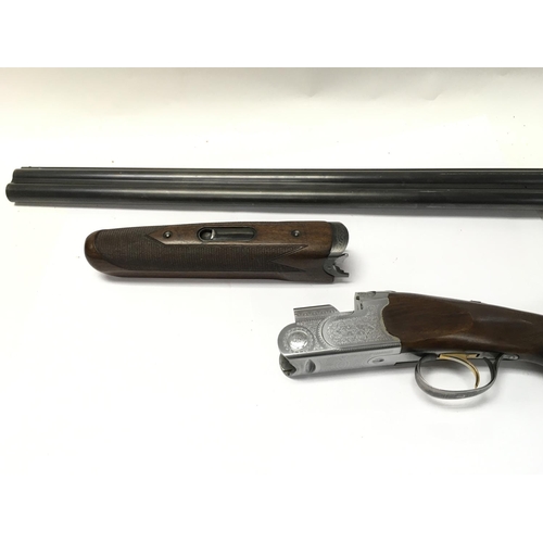 1597 - Baretta 686s 12g over under shotgun. 28inch barrel multi choke and ejector. Serial number E52352B Pl... 