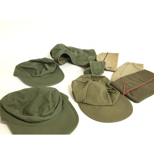 1606 - A collection of US military hats including Korean war, Vietnam war and other British examples