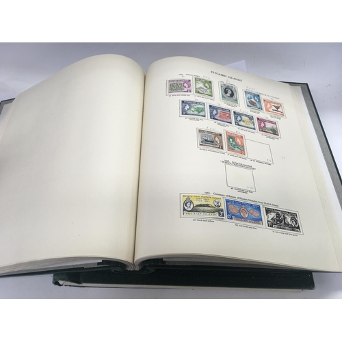 1673 - A large collection of mounted mint Queen Elizabeth commonwealth postage stamps from 1952-1962, house... 