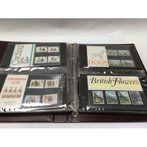 1708 - 13 albums of great Britain presentation packs together with one plastic container.