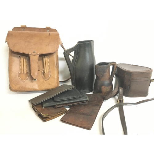 1838 - A collection of vintage leather bags, purses etc. Postage category c