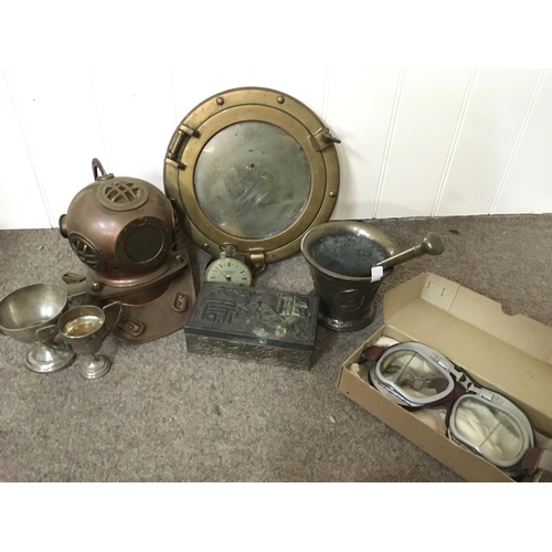 1840 - A collection of assorted items including a small brass and copper scuba diver helmet, a bronze morta... 