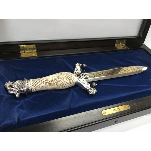 1867 - A cased collectors viking dagger (39cm long), made in Germany. This lot cannot be posted