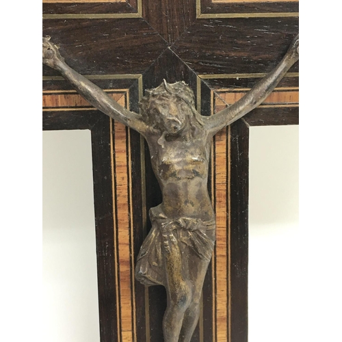 1876 - A crucifix inlaid wooden cross with a bronze figure of christ, dimensions approximately 25x15cm. Pos... 