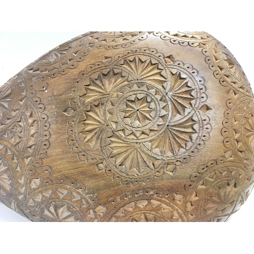 1879 - A wooden Gusle with a carved design body and skin drum cover ,approximately 60Cm long. postage categ... 