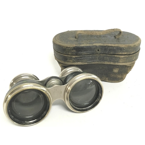 1904 - A pair of cased French Field and Marine binoculars, this lot cannot be posted. NO RESERVE